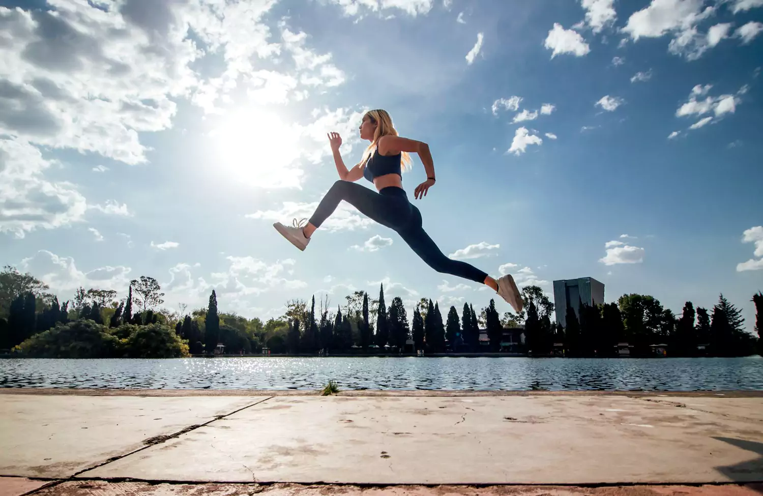 energetic woman leaping in the air